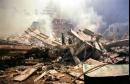 Firefighters make their way through the destruction at New York's World Trade Center after a terrorist attack on the twin towers of lower Manhattan Tuesday, Sept. 11, 2001. In the most devastating terrorist onslaught ever waged against the United States, knife-wielding hijackers crashed two airliners into the World Trade Center on Tuesday, toppling its twin 110-story towers. (AP Photo/Alex Fuchs)