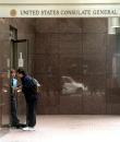 A security guard at the U.S. Consulate in Vancouver denies entrance to a man Tuesday, Sept.11, 2001. The building was sealed after a number of terrorist attacks in New York and Washington. (CP PHOTO/Vancouver Province/Jason Payne)