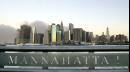 A sign with the Indian name for Manhattan frames the skyline of Manhattan without the World Trade towers, as seen from the Brooklyn borough of New York, early Wednesday, Sept. 12, 2001. Hijacked commercial airpcrafts crashed into the towers Tuesday, causing their collapse. (AP Photo/Kathy Willens)