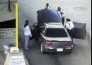 U.S. Customs agents inspect a vehicle at the Detroit-Windsor tunnel in Detroit, Wednesday, Sept. 12, 2001. The border tunnel to Windsor, Ontario was reopened and vehicles were searched in the wake of terrorist attacks in the United States.  (AP Photo/Carlos Osorio)