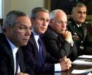 President Bush sits with his National Security Council during a meeting in the Cabinet Room of the White House, Wednesday, Sept. 12, 2001. From left to right, Secretary of State Colin Powell, President Bush, Vice President Dick Cheney and Chairman of the Joint Chief of Staff Gen. Henry Shelton.  Bush condemned terrorist attacks in New York and Washington as ``acts of war,'' and said he would ask Congress for money to help in the recovery and protect the nation's security .  (AP Photo/Doug Mills)