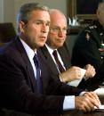 President Bush sits with Vice President Dick Cheney during a National Security Council meeting in the Cabinet Room of the White House, Wednesday, Sept. 12, 2001. Bush condemned terrorist attacks in New York and Washington as ``acts of war,'' and said he would ask Congress for money to help in the recovery and protect the nation's security.  (AP Photo/Doug Mills)