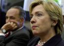 Sen. Charles Schumer, D-N.Y., left, and Sen. Hillary Clinton, D-N.Y., listen to reporters' questions at the Capitol in Washington, Wednesday, Sept. 12, 2001.  (AP Photo/Kenneth Lambert)