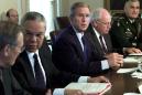 President Bush sits with his National Security Council during a meeting in the Cabinet Room of the White House, Wednesday, Sept. 12, 2001. From left to right, Secretary of Defense Donald Rumsfeld, Secretary of State Colin Powell, President Bush, Vice President Dick Cheney and Chairman of the Joint Chief of Staff Gen. Henery Shelton.  Bush condemned terrorist attacks in New York and Washington as ``acts of war,'' and said he would ask Congress for money to help in the recovery and protect the nation's security  .  (AP Photo/Doug Mills)