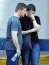 A couple comfort each other as they wait in line to get information on missing relatives Wednesday, Sept. 12, 2001, at New York University Medical Center in New York. They were checking who was admitted to the medical center after the terrorist attack at the World Trade Center Tuesday. (AP Photo/Diane Bondareff)