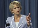 Assistant Secretary of Defense Public Affairs, Victoria Clarke, answers questions during a news conference at the Pentagon, Wednesday, Sept 12, 2001. Clarke stated that the Pentagon would not release speculative numbers on those dead and or missing after Tuesday's plane crash into the Pentagon. (AP Photo/Hillery Smith Garrison)