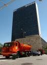 Trucks are parked in front of the United Nations building Wednesday, Sept. 12, 2001, as security is enhanced around New York following the terrorist attack at the World Trade Center September 11.   Rescue workers continue to work in the rubble of the 110-story buildings that were struck by two hijacked airliners. (AP Photo/Louis Lanzano)