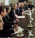 President Bush sits with his National Security Council during a meeting in the Cabinet Room of the White House, Wednesday, Sept. 12, 2001. From left to right, CIA Director George Tentent, Secretary of Defense Donald Rumsfeld, Secretary of State Colin Powell, President Bush, Vice President Dick Cheney and Chairman of the Joint Chief of Staff Gen. Henry Shelton, and National Security Advisor Condoleeza Rice. Bush, addressing the nation Tuesday night, condemned the 'acts of mass murder' that brought down the towers of the World Trade Center in New York, killed 266 people on four hijacked planes and breached the Pentagon, the nerve center of the U.S. armed forces.  (AP Photo/Doug Mills)