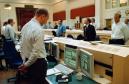 Stock traders at the Nordea Bank in Stockholm, Sweden, hold a moment of silence Wednesday, Sept.12, 2001, for the victims of Tuesday's terrorist attacks against New York and Washington. Stock exchanges, including those in London and Madrid, suspended trading for a minute at 8:45 a.m. EDT -- 24 hours after the first plane crashed into the World Trade Center.  (AP photo/Henrik Montgomery)