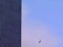 Television image of a body falling from one of the towers of New York's World Trade Center, following a fire caused when two hijacked airliners were crashed into the buildings, September 11, 2001. The two towers collapsed to the ground a short time later. An aircraft was also crashed into the Pentagon near Washington this morning and another airliner crashed near Pittsburgh, Pennsylvania in an apparently related action.    REUTERS/REUTERS TV