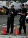 Two members of the emergency response team of the FBI stand guard outside the Federal Building in Los Angeles, September 11, 2001. The Los Angeles office of the FBI is located in the building and the Federal Building was closed due to the terrorism acts in New York and Washington.  REUTERS/Jim Ruymen