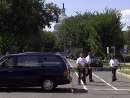 Supreme Court police officers stand guard outside Capitol Hill in Washington, September 11, 2001. In the worst attack on American soil since Pearl Harbor, three hijacked planes slammed into the Pentagon and New York's landmark World Trade Center on Tuesday, demolishing the two 110-story towers that symbolize U.S. financial might. The attacks brought normal life across the United States to a standstill, turning the major cities of the nation into eerie ghost towns. All financial markets were closed, millions of workers sent home early, all flights around the nation were canceled and all airports shut in an unprecedented move. REUTERS/Brendan McDermid