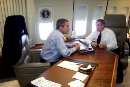 U.S. President George W. Bush talks with Chief of Staff Andrew Card (R) aboard Air Force One during a flight to Offutt Air Force Base in Omaha, Nebraska following a statement about the two planes that crashed into the World Trade Center in New York City, September 11, 2001. REUTERSPool/Doug Mills