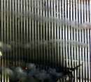 People look out of the burning North tower of the World Trade Center in New York City September 11, 2001. Both towers were hit by planes crashing into the buildings. Shortly after this photo was taken this tower fell. In the worst attack on American soil since Pearl Harbor, three hijacked planes slammed into the Pentagon and New York's landmark World Trade Center on Tuesday, demolishing the two 110-story towers that symbolize U.S. financial might.     REUTERS/Jeff Christensen