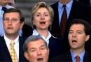 Members of the U.S. Congress sing 'God Bless America' during a ceremony at the U.S. Capitol September 11, 2001. The members of Congress met together to show their unity in a time of crisis and to reassure the nation that the government will continue to run normally. (L-R) are Sen. Conrad, Sen. Kent Conrad (D-ND), Sen. Kit Bond (R-MO), Sen. Hillary Clinton (D-NY) and Sen. Sam Brownback (R-KS).  REUTERS/Win McNamee