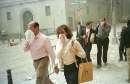 Office workers walk along Wall Street after the World Trade Center collapse September 11, 2001. Two hijacked comercial planes crashed into the World Trade Center earlier.                                          REUTERS/Richard Cohen