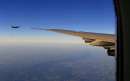 A U.S. F-16 fighter flies just off the wing of Air Force One on a flight back to Washington September 11, 2001. President George W. Bush returned to the White House where he will address the nation from the Oval Office about the terrorist attacks at the World Trade Center and the Pentagon. REUTERS/Pool/Doug Mills