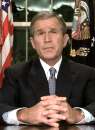 President George W. Bush addresses the nation from the Oval Office of the White House after three planes commandeered by unknown hijackers slammed into the Pentagon and New York's World Trade Center September 11, 2001.  Bush returned to the White House early this evening to address this crisis.  REUTERS/Larry Downing