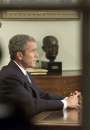 U.S. President George W. Bush pauses after addressing the nation from the Oval Office at the White House in Washington, September 11, 2001. The president spoke about the terrorist attacks launched earlier today on the U.S.  REUTERS/Larry Downing