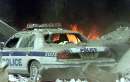 A police car sits amid rubble near the base of the destroyed World Trade Center towers in New York on September 11, 2001.Two hijacked commercial planes slammed into the twin towers of the World Trade earlier in the day, causing both 110-story landmarks to collapse in thunderous clouds of fire and smoke and killing a 'tremendous number' of people starting their workday inside.  REUTERS/Peter Morgan