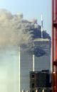 The upper floors of the World Trade Center burn, early September 11, 2001 after a plane crashed into the building. A second aircraft crashed into the other tower a short time later. (Peter Morgan/Reuters)