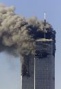 Smoke billows from the two World Trade Center towers after TWO planes crashed into each tower, in New York on September 11, 2001. (Peter Morgan/Reuters)