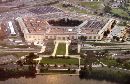 An aircraft crashed into the helipad next to the Pentagon (right rear side in photo), setting off a huge explosion, throwing people off their feet inside the building and setting off a massive fire, U.S. officials and eyewitnesses said, September 11, 2001.  The Pentagon is shown July 30, 2001. (Hyungwon Kang/Reuters)