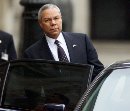 Secretary of State Colin Powell gets in his car after a meeting with Peru's President Alejandro Toledo in Lima's Government Palace, September 11, 2001. Powell will fly home to Washington after attacks on the World Trade Center in New York and the Pentagon in Washington. (Pilar Olivares/Reuters)