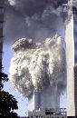 World Trade Center tower two falls to the ground, early September 11, 2001. Both towers have fallen after planes crashed into the buildings. (Jeff Christensen/Reuters)