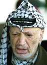 Palestinian President Yasser Arafat speaks to reporters in Gaza following the news of the plane attacks in the United States September 11, 2001. Arafat sent his condolences to President George W. Bush and condemned the bombings as 'unbelievable' and 'terrible.' (Suhaib Salem/Reuters)