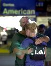 A woman is consoled outside the American Airlines terminal in Boston, Massachusetts, September 11, 2001, where it is believed that the American Airlines plane that crashed into the World Trade Center in New York City departed from. The airplane attacks that destroyed New York's World Trade Center and damaged the Pentagon were unprecedented in the history of civil aviation, security experts said. (Brian Snyder/Reuters)