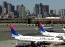 Planes sit idle at Logan Airport in Boston, Massachusetts September 11, 2001. All commercial U.S. aviation was halted until Wednesday at the earliest after three hijacked aircraft crashed into the World Trade Center in New York and the Pentagon. A fourth plane also believed to have been hijacked crashed near Pittsburgh. For the first time ever the Federal Aviation Administration issued a directive grounding all commercial aircraft nationwide.  (Brian Snyder/Reuters)