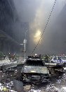 Burned cars sit outside the World Trade Center following the collapse of both towers after two planes crashed into the buildings in New York on September 11, 2001. Thousands of panicked New Yorkers poured into the streets of Manhattan, choking on white ash that billowed through a 20-block radius around the collapsed buildings. Three hijacked planes crashed into U.S. landmarks  destroying both of New York's mighty twin towers and also plunging the Pentagon in Washington into flames in an unprecedented assault on key symbols of U.S. military and financial power. (Peter Morgan/Reuters)