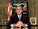 President George W. Bush in an address to the nation September 11, 2001 that the aircraft attacks on the World Trade Center and the Pentagon had 'ended thousands of lives' and in responding America would make no distinction between 'the terrorists and those who harbor them.' Bush, for the first time alluding to the enormity of the casualties in the attacks, said: 'Thousands of lives were suddenly ended by evil, despicable acts of terror.' Bush is seen during the address in the Oval Office at the White House.  (Larry Downing/Reuters)