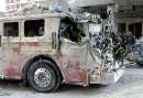 A fire truck sits smashed near the World Trade Center in New York on September 11, 2001. Two hijacked U.S. commercial planes slammed into the twin towers of the World Trade Center early on Tuesday, causing both 110-story landmarks to collapse in thunderous clouds of fire and smoke. REUTERS/Shannon Stapleton