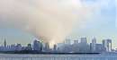 Smoke from the remains of New York's World Trade Center shrouds lower Manhattan as the Statue of Liberty stands in the foreground in this image taken across New York Harbor from Jersey City, New Jersey, September 12, 2001. Each of the twin towers were hit by hijacked airliners and collapsed in one of numerous acts of terrorism directed at the United States September 11, 2001.   REUTERS/Ray Stubblebine