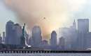 Smoke from the remains of New York's World Trade Center shrouds lower Manhattan as the Statue of Liberty stands in the foreground and a lone seagull flies by in this image taken across New York Harbor from Jersey City, New Jersey, September 12, 2001. Each of the twin towers were hit by hijacked airliners and collapsed in one of numerous acts of terrorism directed at the United States September 11, 2001.   REUTERS/Ray Stubblebine