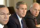 U.S. President George W. Bush, flanked by Secretary of State Colin Powell (L) and Vice President Dick Cheney, holds a meeting with his national security team in the Cabinet Room of the White House, September 12, 2001. The meeting comes a day after terrorists struck New York City and Washington. REUTERS/Kevin Lamarque