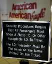 Security notices are still posted at the American Airlines terminal where only airline and airport workers with photo identification were allowed to enter, at Logan Airport in Boston, Massachusetts, September 12, 2001. An American and a United flight from Boston were hijacked and crashed into the World Trade Center in New York City September 11.    REUTERS/Brian Snyder