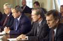 President George W. Bush (2nd L) looks down during his meeting with congressional leaders in the Cabinet Room of the White House, September 12, 2001. From left are Speaker of the House Dennis Hastert (R-IL), President Bush, Secretary of Defense Donald Rumsfeld and Senate Majority Leader Tom Daschle (D-SD). The meeting comes a day after terrorists struck New York City and Washington.      REUTERS/Kevin Lamarque