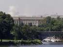 Smoke rises over the Pentagon as it continues to burn September 12, 2001, the day after a hijacked airliner crashed into the building. Two other hijacked aircraft crashed into New York's World Trade Center towers, eventually resulting in their collapse and another airliner crashed in rural Pennsylvania, in a related incident.   REUTERS/Brendan McDermid