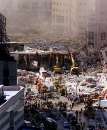 Workers dig in the wreckage of the World Trade Center in New York City, September 12, 2001. The World Trade Center towers were destroyed after being struck by planes in a terrorist attack on September 11.  REUTERS/Mike Segar