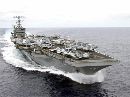 Defense officials refused to speculate on any quick military response to the worst attack on U.S. soil since Pearl Harbor, but stressed the culprits of the strikes would be punished. The USS Carl Vinson, shown in the Pacific Ocean July 30, 2001, is currently deployed in the Gulf. (Daniel Smith/US Navy via Reuters)