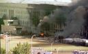 The south side of the Pentagon burns Tuesday, Sept. 11, 2001 as seen from atop the River House Apartments in Arlington, Va. (AP Photo/Tom Horan)