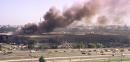 Vehicles are shown leaving the area of the Pentagon along Interstate 395, Tuesday, Sept. 11, 2001, after a plane crash that was apparently a part of a coordinated terrorist attack that brought down the twin towers of the World Trade Center in New York. Arlington, Va. (AP Photo/Tom Horan)