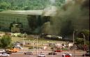 Vehicles are shown traveling on Interstate 395, leaving Washington, in front of the Pentagon, following an explosion Tuesday, Sept. 11, 2001, in Arlington, Va. (AP Photo/Tom Horan)